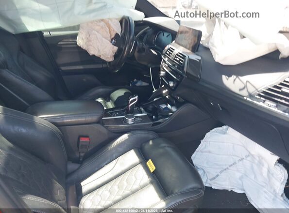 5YMTS0C04L9B74120 2020 BMW X3 Red Widok wnętrza z przodu