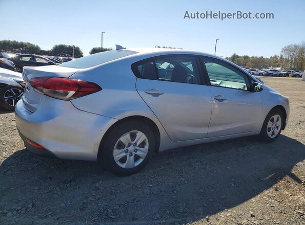3KPFK4A74JE219463 2018 KIA FORTE Серебряный Передняя правая четверть