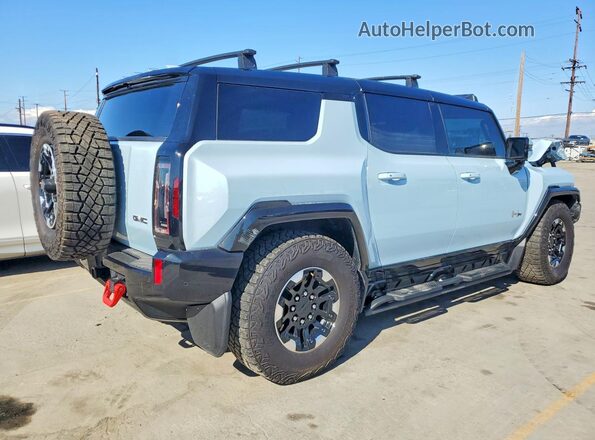 1GKB0NDE2RU104964 2024 GMC HUMMER Silver Przód prawy