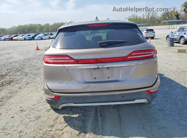5LMCJ1C93KUL17267 2019 LINCOLN MKC Бежевый Вид салона спереди
