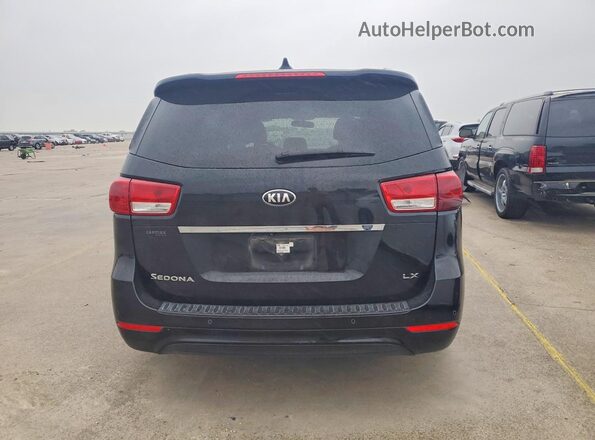 KNDMB5C16H6266029 2017 KIA SEDONA Black Widok wnętrza z przodu