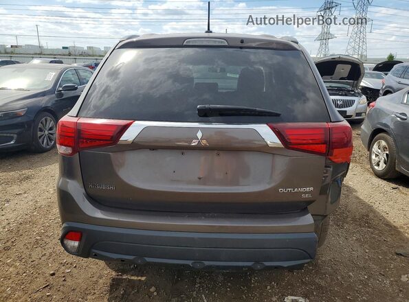 JA4AD3A31GZ015903 2016 MITSUBISHI OUTLANDER Коричневый Вид салона спереди