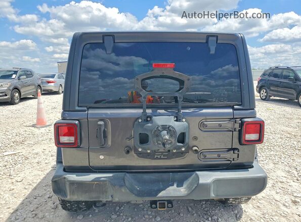1C4HJXDG0KW612537 2019 JEEP WRANGLER Серый Вид салона спереди