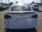 2023 Tesla Model Y White vin: 7SAYGDEE0PA052489