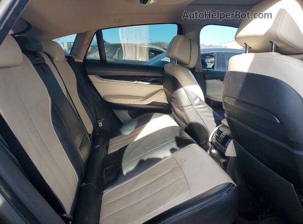5UXKU2C53G0N78795 2016 BMW X6 Угольный Вид задней части салона