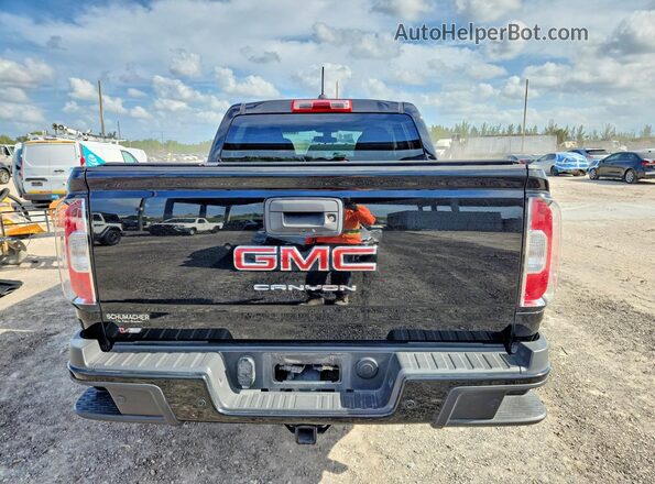 1GTG5BEN1M1179259 2021 GMC CANYON Черный Вид салона спереди