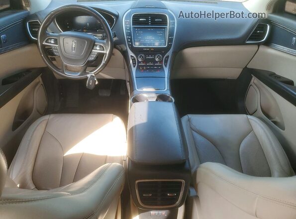2LMPJ6K92KBL18911 2019 LINCOLN NAUTILUS Tan Widok zestawu wskaźników