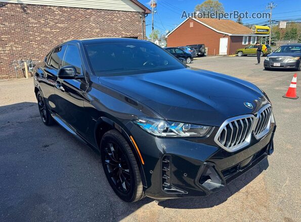 5UX33EX08R9T65489 2024 BMW X6 Черный Вид спереди