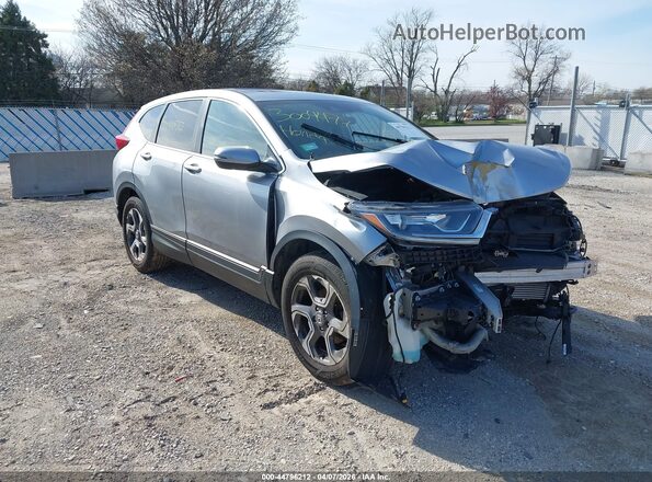7FARW2H58JE001079 2018 HONDA CR-V Серебряный Передняя правая четверть