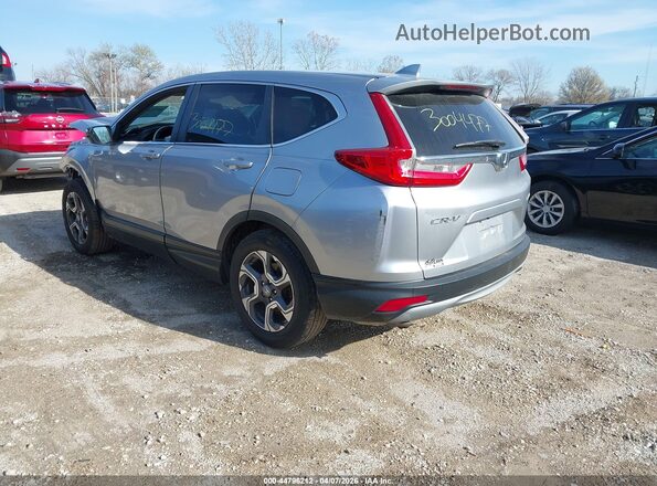 7FARW2H58JE001079 2018 HONDA CR-V Серебряный Задняя левая четверть