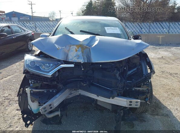 7FARW2H58JE001079 2018 HONDA CR-V Серебряный Вид задней части салона