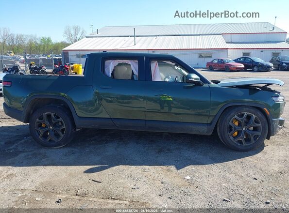 7FCTGCAP3SN041308 2025 RIVIAN R1T Green Rear interior view