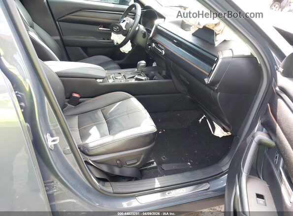 7MMVAAEW5SN115771 2025 MAZDA CX-50 HYBRID Gray Vista interior delantera
