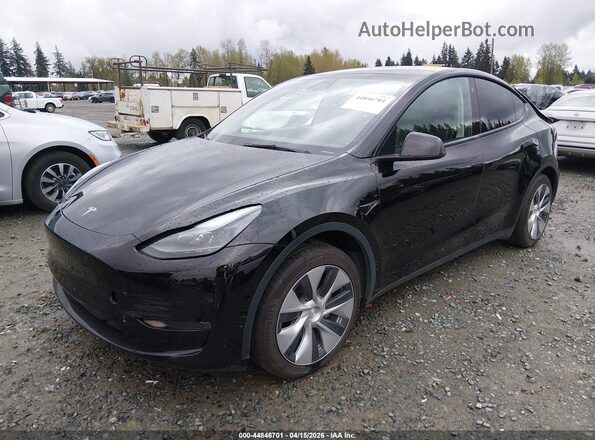 7SAYGAEE1NF535083 2022 TESLA MODEL Y Black Առջևի ձախ երեք քառորդ տեսարան