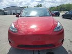 2023 Tesla Model Y Красный vin: 7SAYGAEE1PF895117