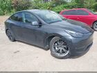 2024 Tesla Model Y Long Range Dual Motor All-wheel Drive Gray vin: 7SAYGAEE1RF199375