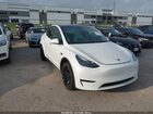 2023 Tesla Model Y   White vin: 7SAYGAEE2PF689210