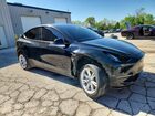 2024 Tesla Model Y Black vin: 7SAYGAEE5RF987107