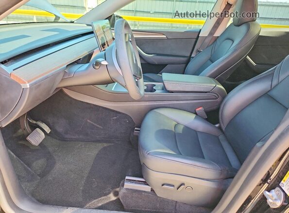 7SAYGAEE5RF987107 2024 TESLA MODEL Black Front interior view