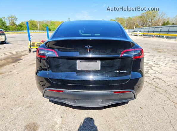 7SAYGAEE5RF987107 2024 TESLA MODEL Black Rear view
