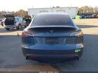 2023 Tesla Model Y Awd/long Range Dual Motor All-wheel Drive Gray vin: 7SAYGAEE6PF612288