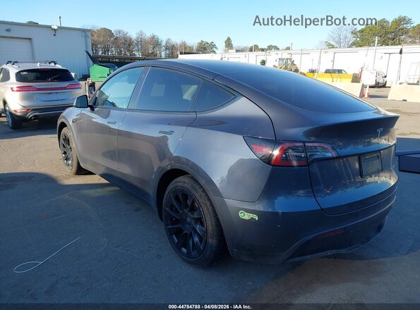 7SAYGAEE6PF612288 2023 TESLA MODEL Y Gray Trasero izquierdo