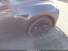 2023 Tesla Model Y Awd/long Range Dual Motor All-wheel Drive Gray vin: 7SAYGAEE6PF612288
