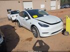 2023 Tesla Model Y Белый vin: 7SAYGAEE6PF758870