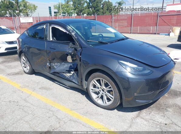 7SAYGAEE8RF034696 2024 TESLA MODEL Y Gray Delantero derecho