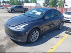 2024 Tesla Model Y Long Range Dual Motor All-wheel Drive Gray vin: 7SAYGAEE8RF034696