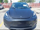 2024 Tesla Model Y Long Range Dual Motor All-wheel Drive Gray vin: 7SAYGAEE8RF034696