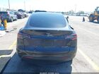 2024 Tesla Model Y Long Range Dual Motor All-wheel Drive Gray vin: 7SAYGAEE8RF034696