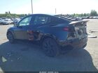 2024 Tesla Model Y Long Range Dual Motor All-wheel Drive Black vin: 7SAYGAEE9RF116260