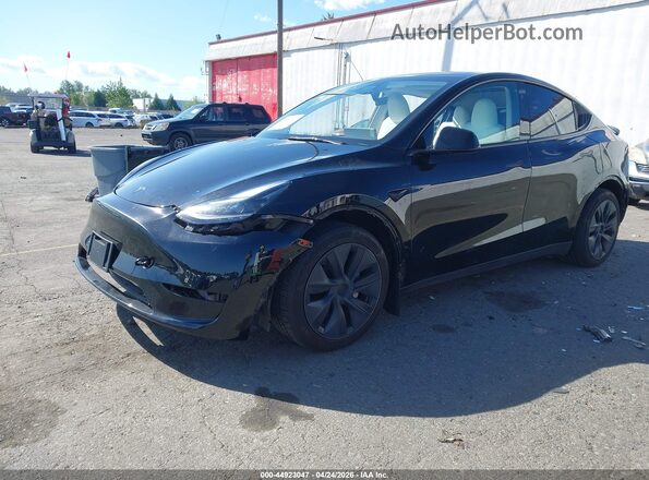 7SAYGAEE9RF116260 2024 TESLA MODEL Y Black Передня ліва чверть