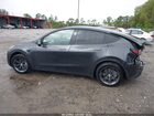 2025 Tesla Model Y Long Range Dual Motor Rear-wheel Drive Gray vin: 7SAYGDED0SF228847