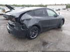 2025 Tesla Model Y Long Range Dual Motor Rear-wheel Drive Gray vin: 7SAYGDED0SF228847