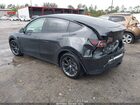 2025 Tesla Model Y Long Range Dual Motor Rear-wheel Drive Gray vin: 7SAYGDED0SF228847