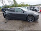 2025 Tesla Model Y Long Range Dual Motor Rear-wheel Drive Gray vin: 7SAYGDED0SF228847