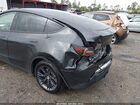 2025 Tesla Model Y Long Range Dual Motor Rear-wheel Drive Gray vin: 7SAYGDED0SF228847
