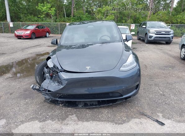 7SAYGDED0SF231375 2025 TESLA MODEL Y Gray ხელსაწყოთა პანელის ხედი