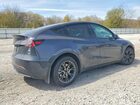 2024 Tesla Model Y Gray vin: 7SAYGDED1RA311050