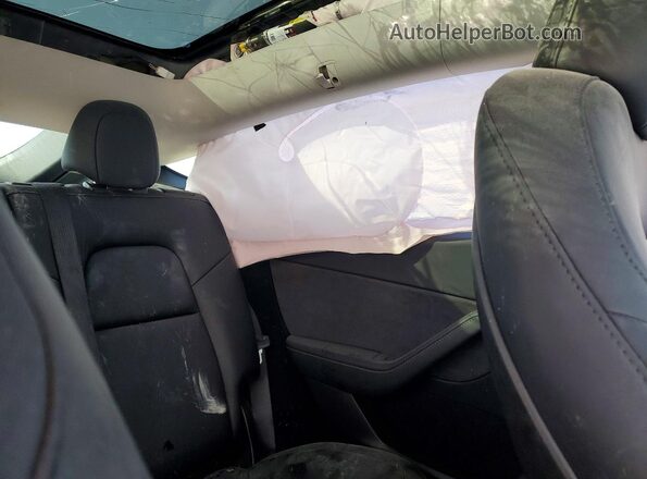 7SAYGDED1RF105309 2024 TESLA MODEL Gray Вид задньої частини салону
