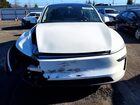 2026 Tesla Model Y White vin: 7SAYGDED1TF378483