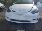 2024 Tesla Model Y Long Range Single Motor Rear-wheel Drive/rwd White vin: 7SAYGDED2RA332070