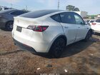 2024 Tesla Model Y Long Range Single Motor Rear-wheel Drive/rwd White vin: 7SAYGDED2RA332070