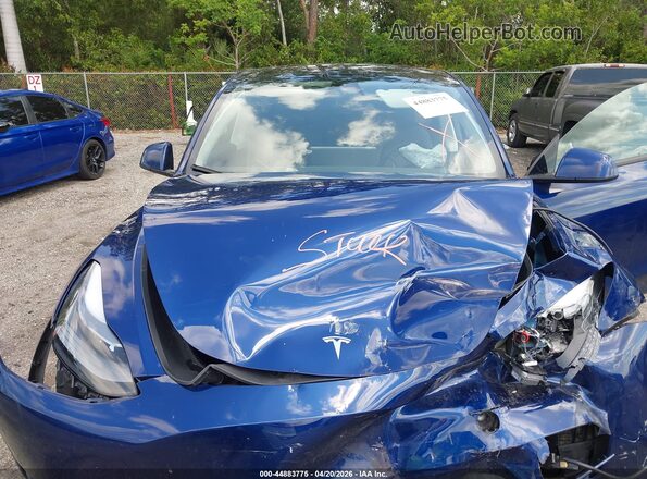 7SAYGDED3RF207310 2024 TESLA MODEL Y Blue Հետևի տեսք
