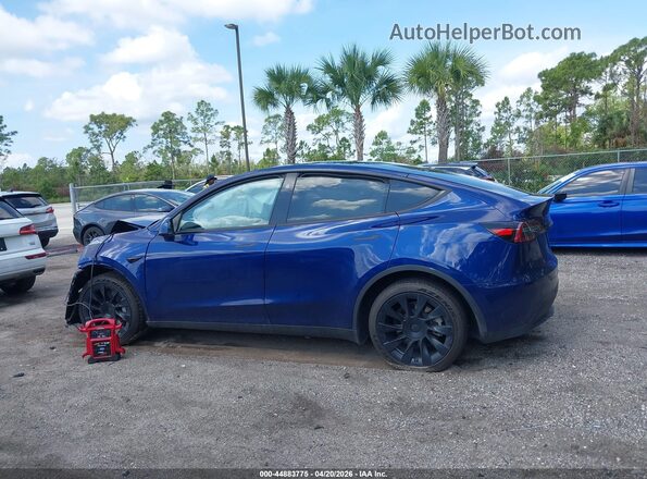 7SAYGDED3RF207310 2024 TESLA MODEL Y Blue Սալոնի հետևի տեսք