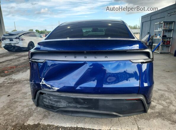 7SAYGDED3TA426515 2026 TESLA MODEL Y Синий Вид салона спереди