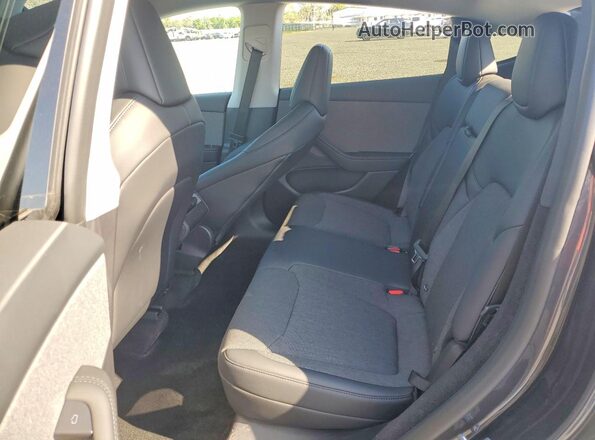 7SAYGDED3TA590847 2026 TESLA MODEL Черный Вид задней части салона