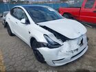 2024 Tesla Model Y Long Range Single Motor Rear-wheel Drive/rwd Белый vin: 7SAYGDED4RF112514